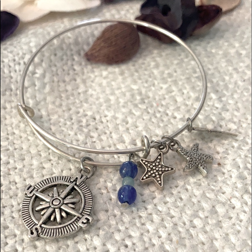 Expanding stainless bracelet Tibetan silver charms